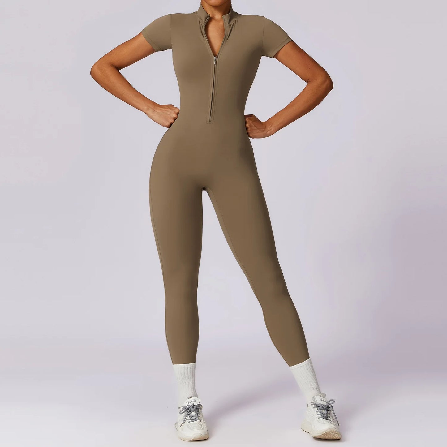 Obcisły kombinezon sportowy Kilimili ViveMotion Swift, efekt drugiej skóry, kolor wielbłądzi brąz.